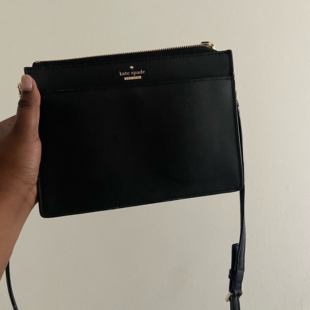 Black Kate spade cross boss